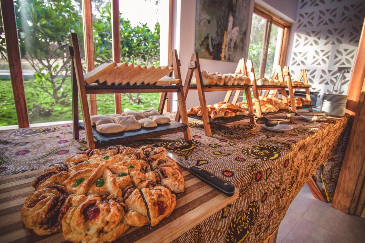 Zanzibella Hotel & Spa Kiwengwa (Zanzibar) Exterior foto A selection of pastries at a buffet