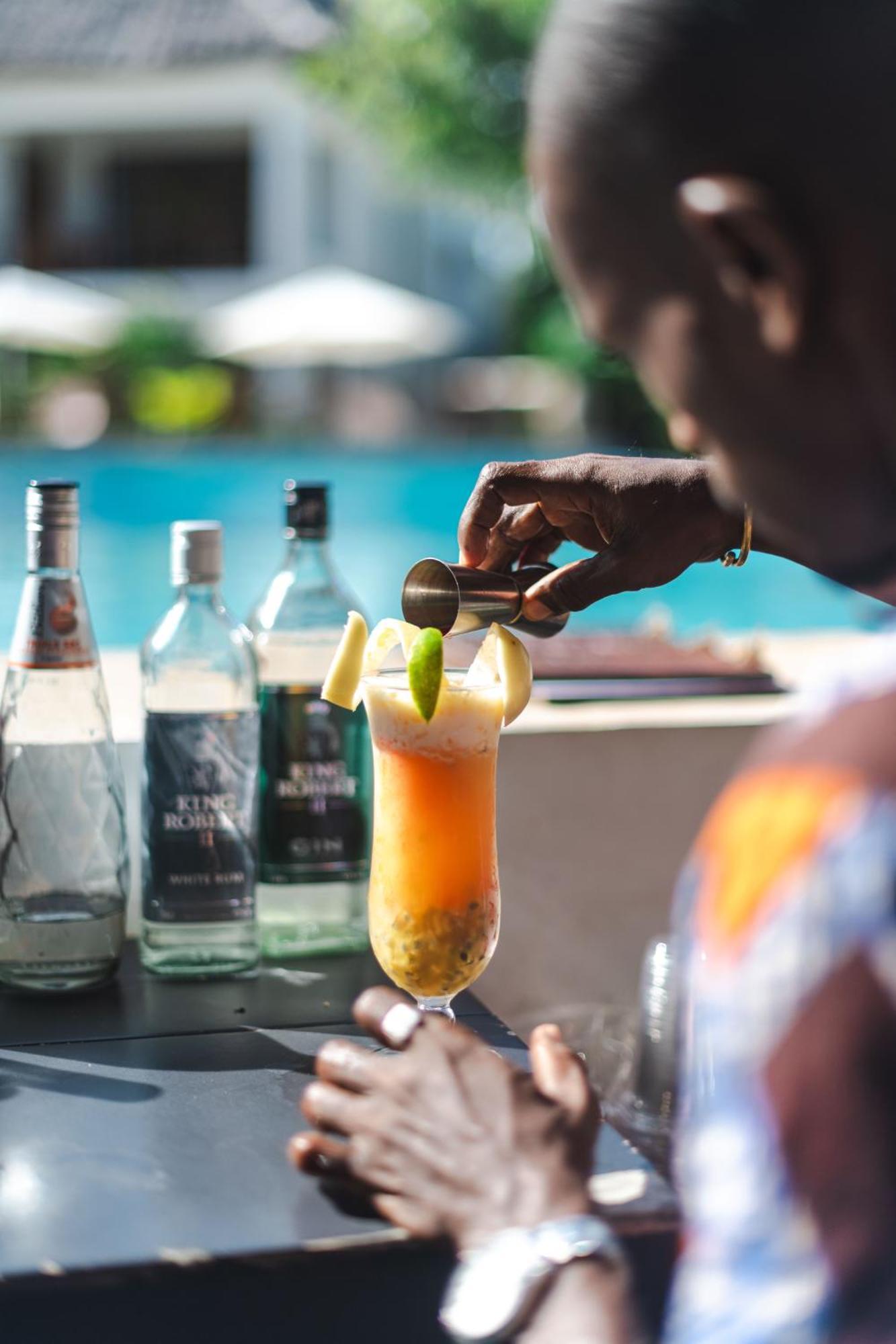 Zanzibella Hotel & Spa Kiwengwa (Zanzibar) Exterior foto A bartender preparing a cocktail